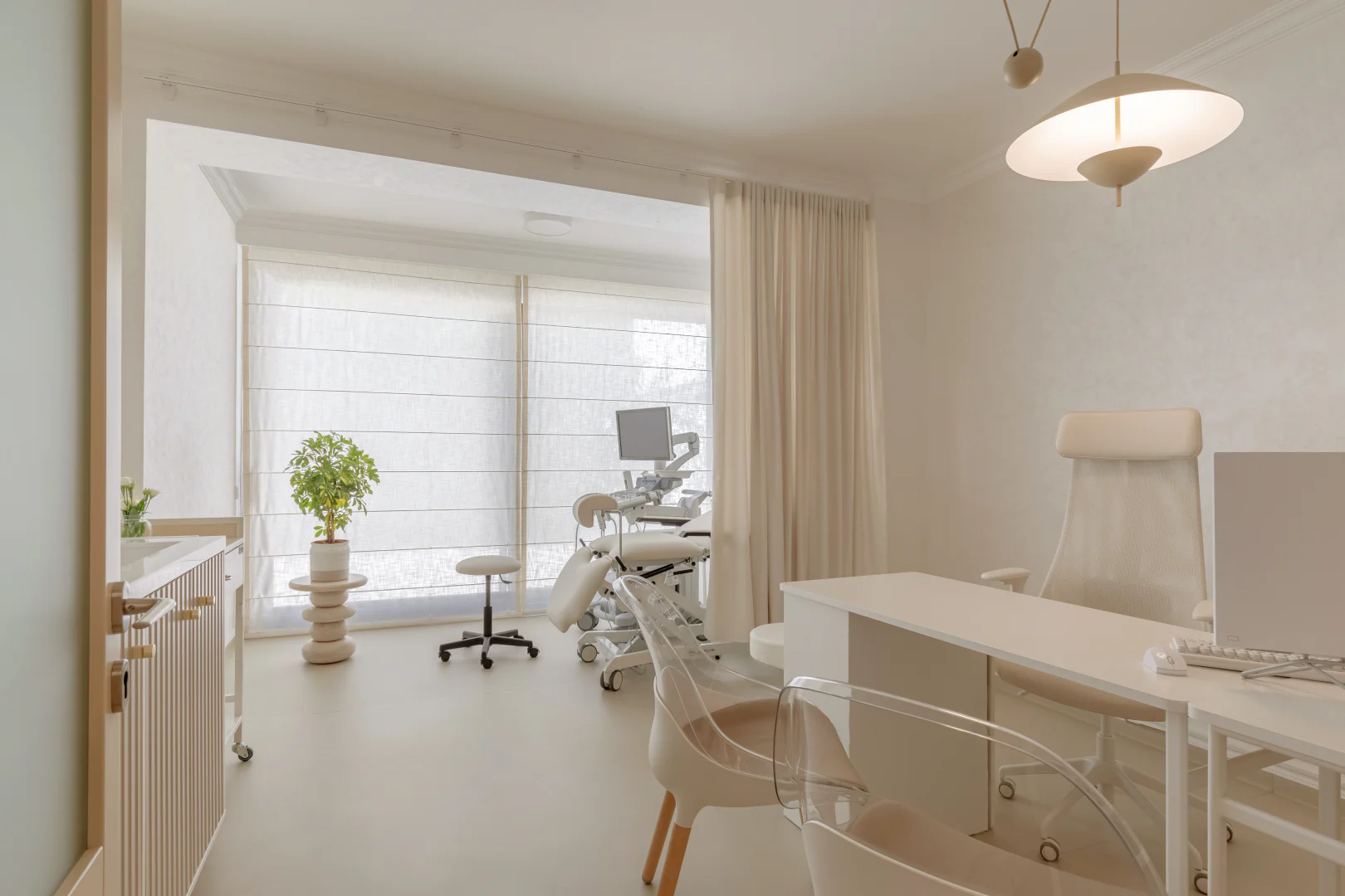 Sphera Care medical office with minimalist white interior and examination equipment